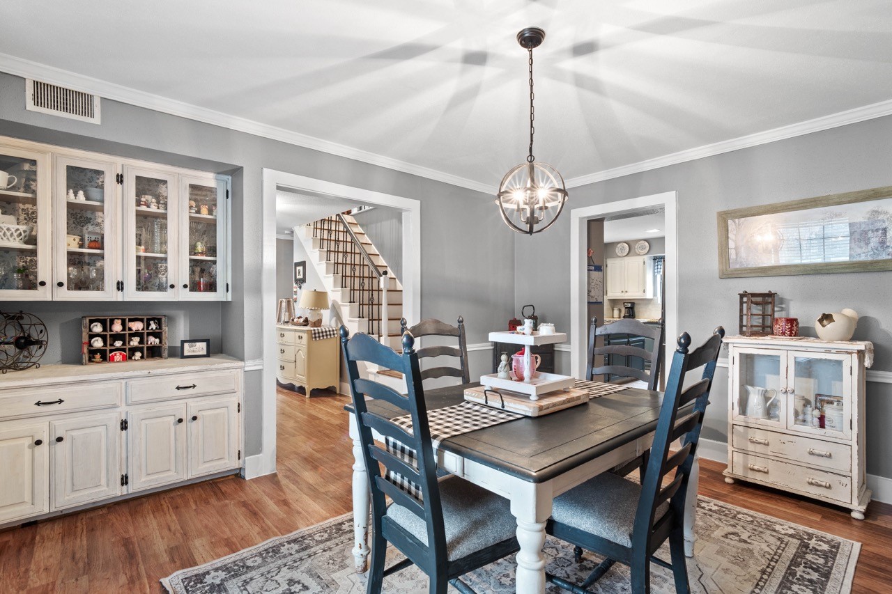 1102 Sherfield Ridge Drive Katy, TX 77450 - Photo 9 of 39 a view of a dining room with furniture and wooden floor