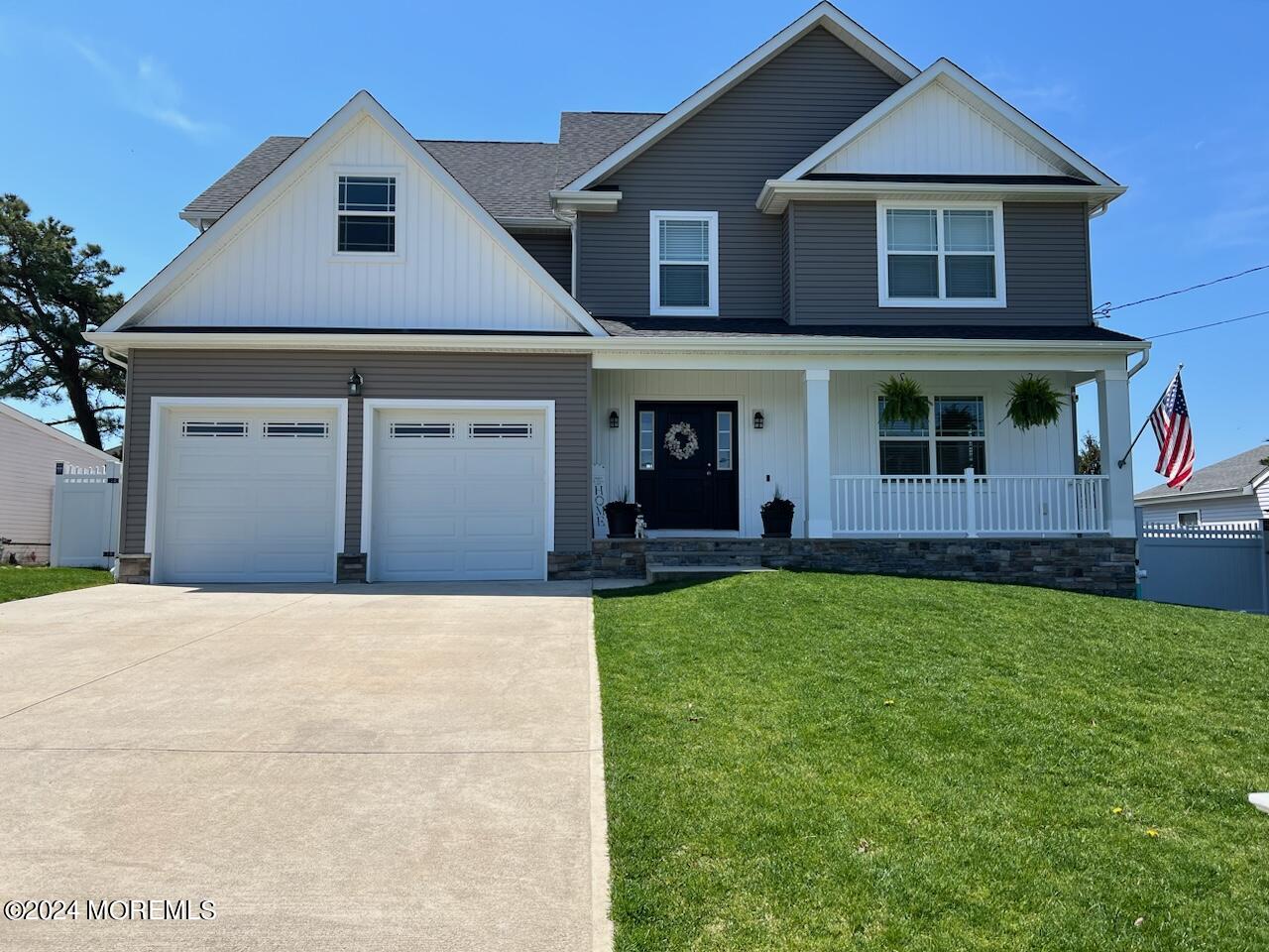290 Privateer Road Manahawkin, NJ 08050 - Photo 1 of 1 a front view of a house with a yard