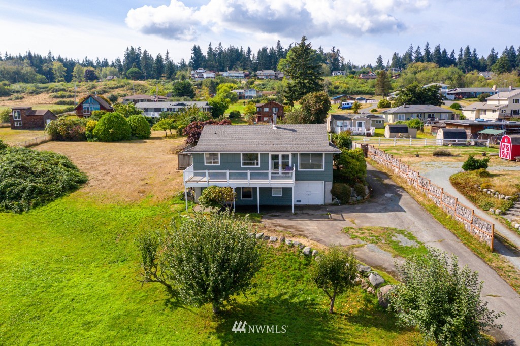 6582 Humphrey Road Clinton, WA 98236 - Photo 2 of 39 a view of a city & an ocean view