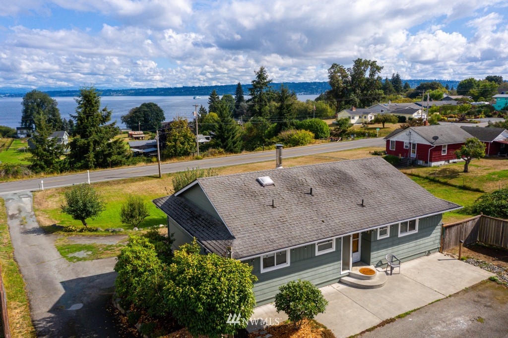 6582 Humphrey Road Clinton, WA 98236 - Photo 36 of 39 an aerial view of a house with garden space and street view