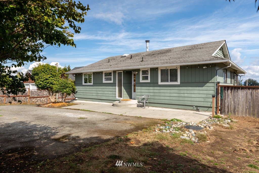 6582 Humphrey Road Clinton, WA 98236 - Photo 37 of 39 a front view of a house with a outdoor space