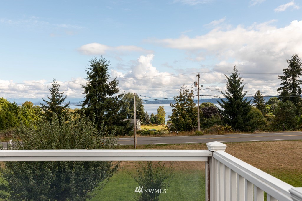 6582 Humphrey Road Clinton, WA 98236 - Photo 5 of 39 a view of a yard and swimming pool