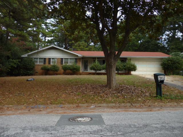 3976 Jane Marie Lane Decatur, GA 30035 - Photo 1 of 1 a front view of a house with garden