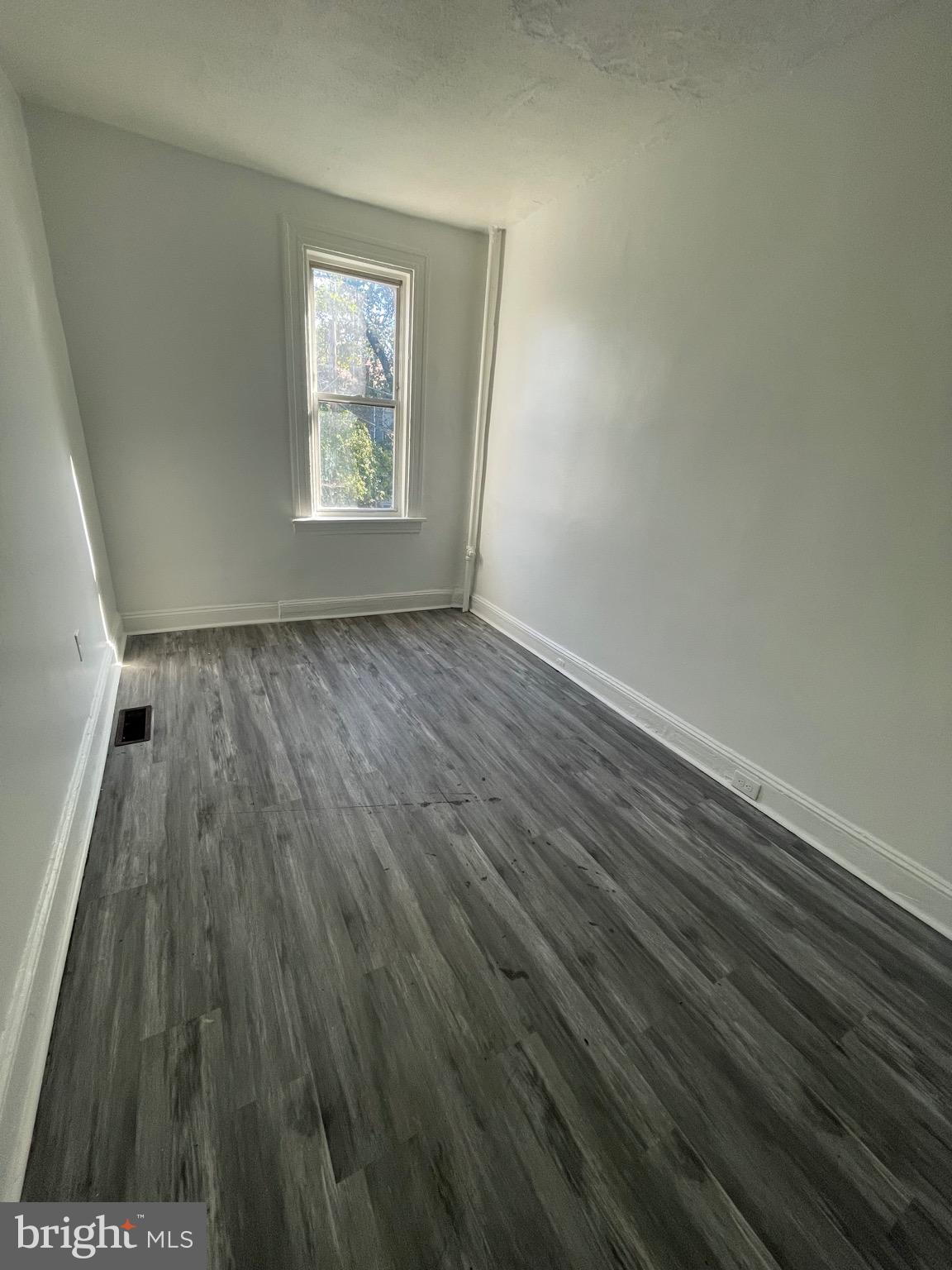 2905 Norfolk Avenue Baltimore, MD 21215 - Photo 11 of 28 a view of an empty room and window
