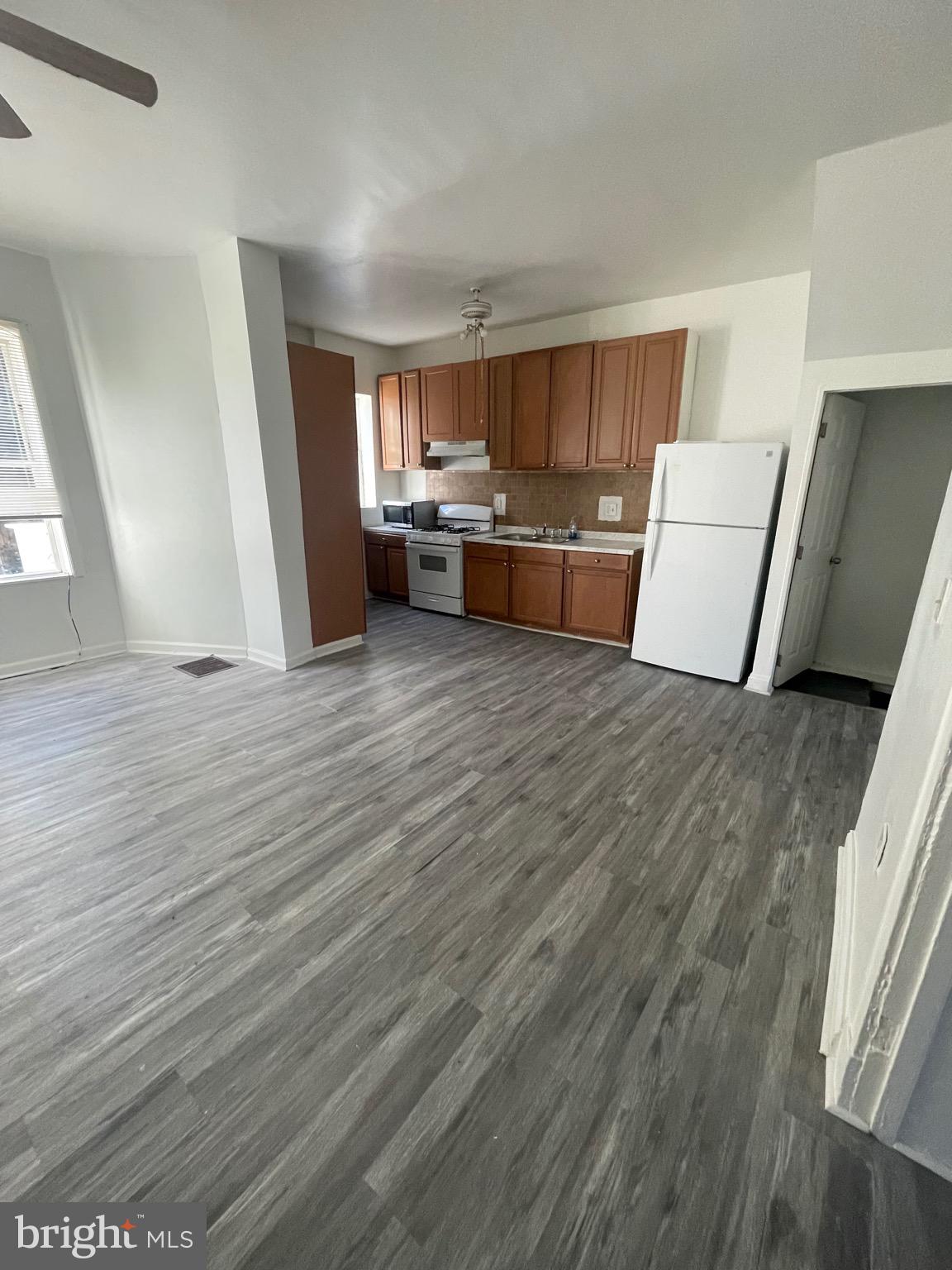 2905 Norfolk Avenue Baltimore, MD 21215 - Photo 4 of 28 a view of kitchen and wooden floor