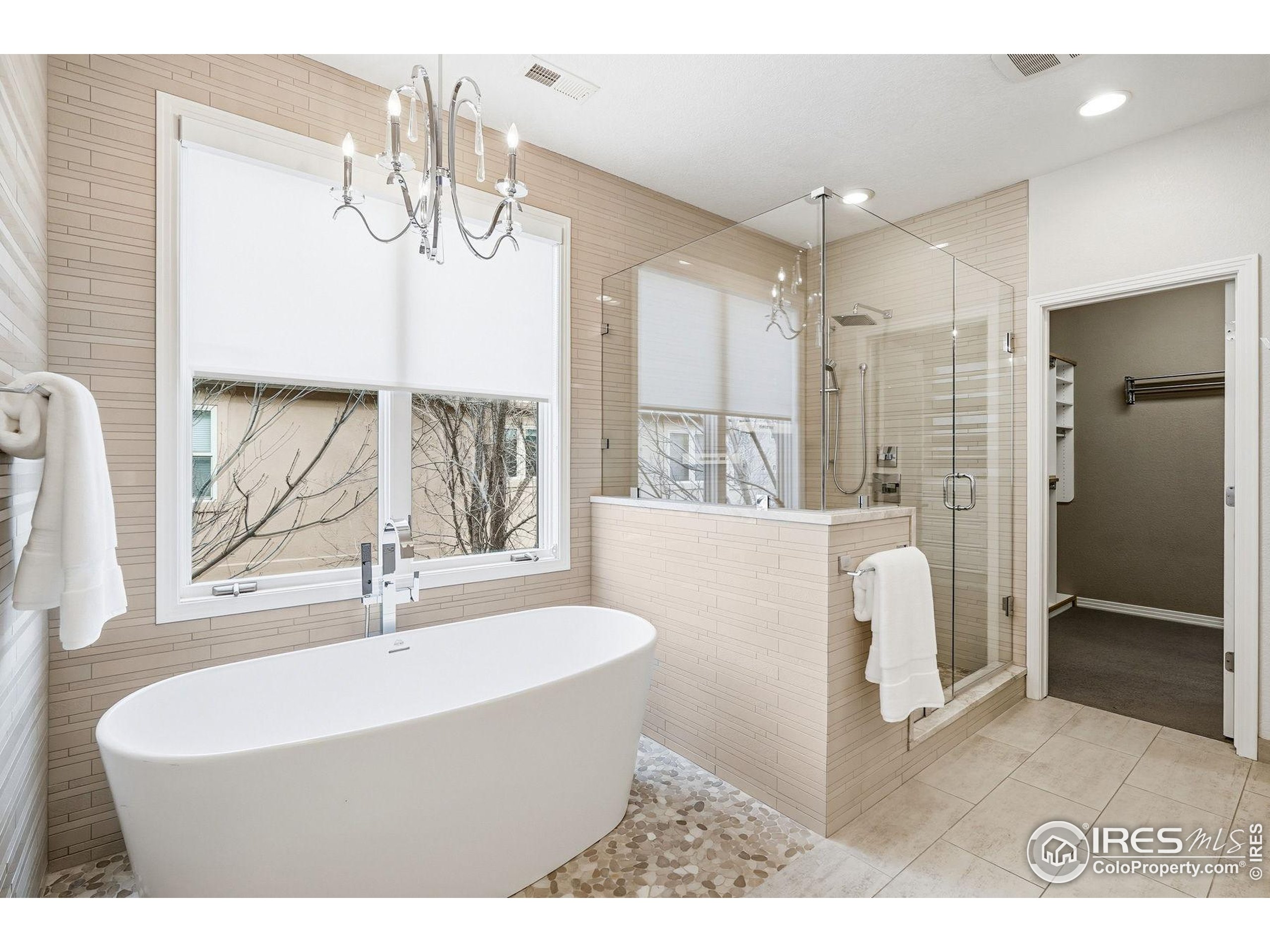 4840 6th Street Boulder, CO 80304 - Photo 22 of 48 a spacious bathroom with a bathtub and a shower