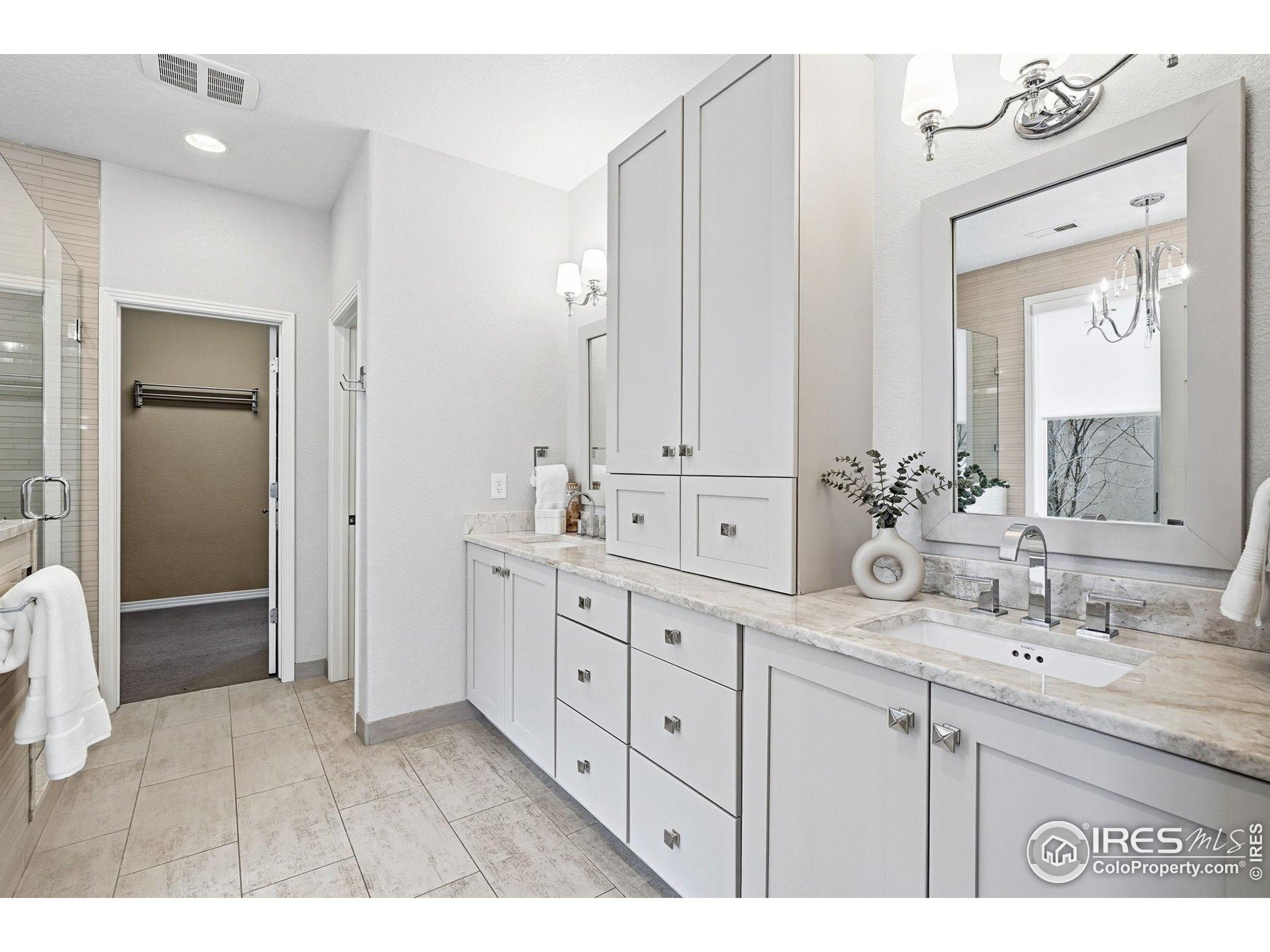 4840 6th Street Boulder, CO 80304 - Photo 23 of 48 a bathroom with a double vanity sink mirror and