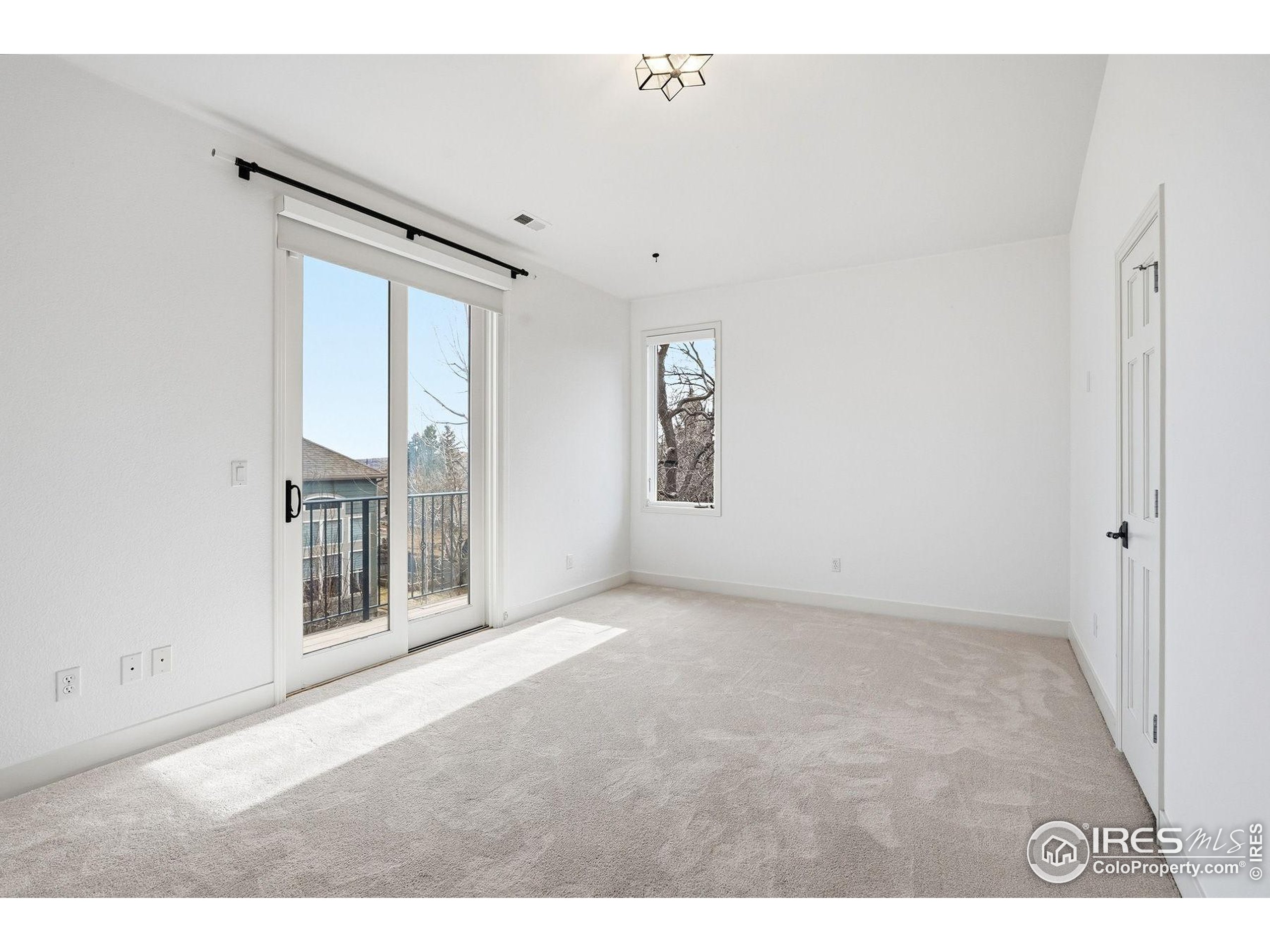 4840 6th Street Boulder, CO 80304 - Photo 27 of 48 a view of an empty room with a window