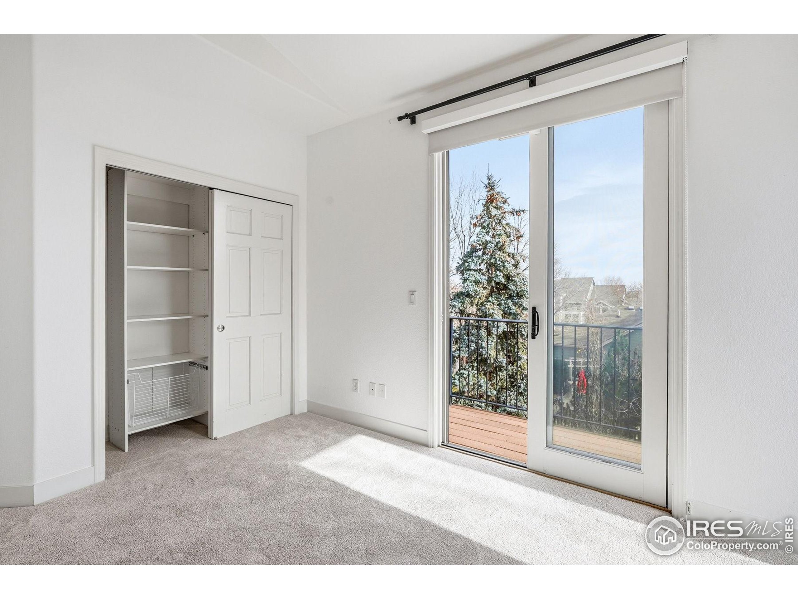 4840 6th Street Boulder, CO 80304 - Photo 28 of 48 a view of an empty room with window and cabinet