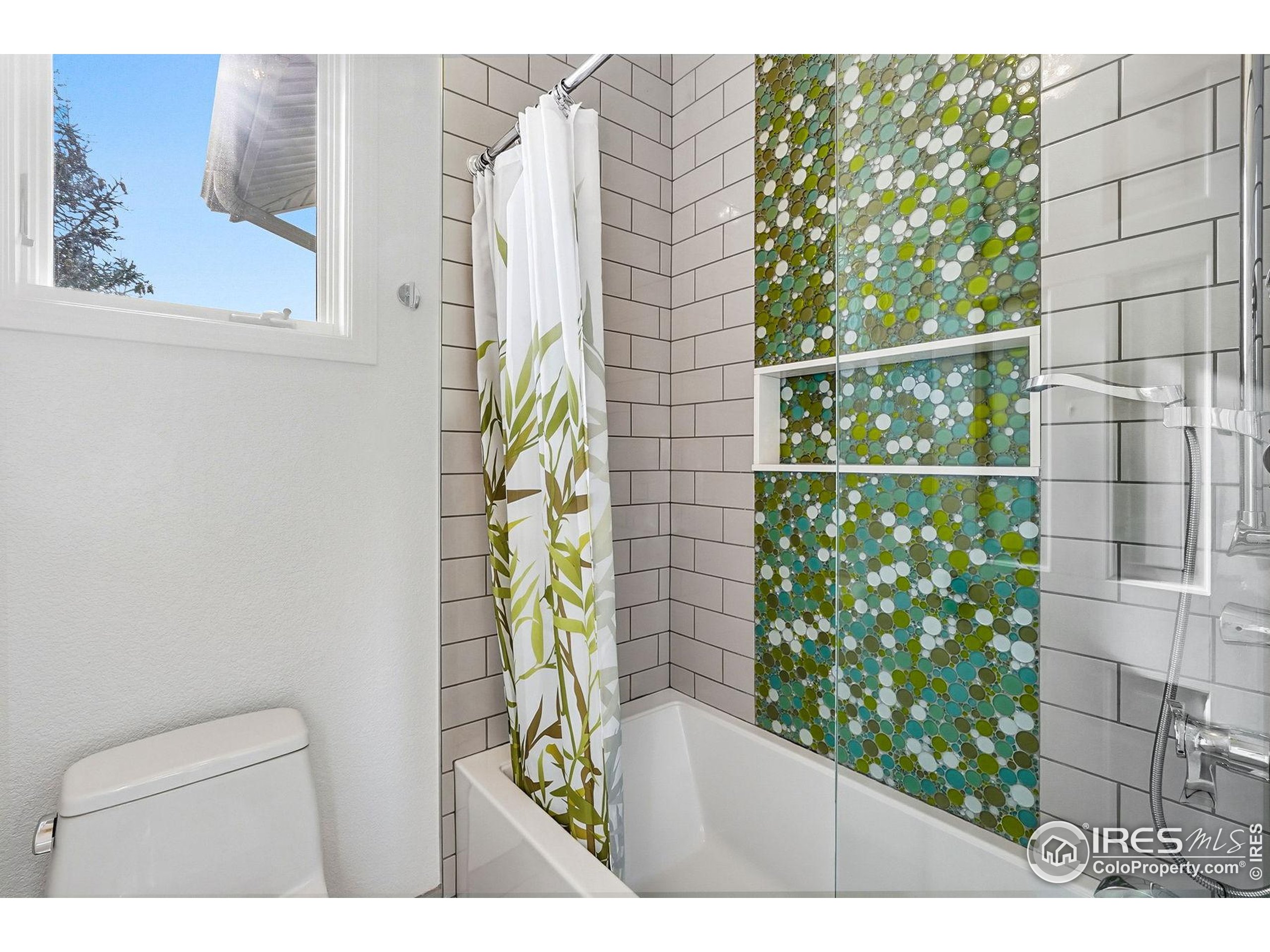 4840 6th Street Boulder, CO 80304 - Photo 31 of 48 a picture of a bathroom with a shower curtain