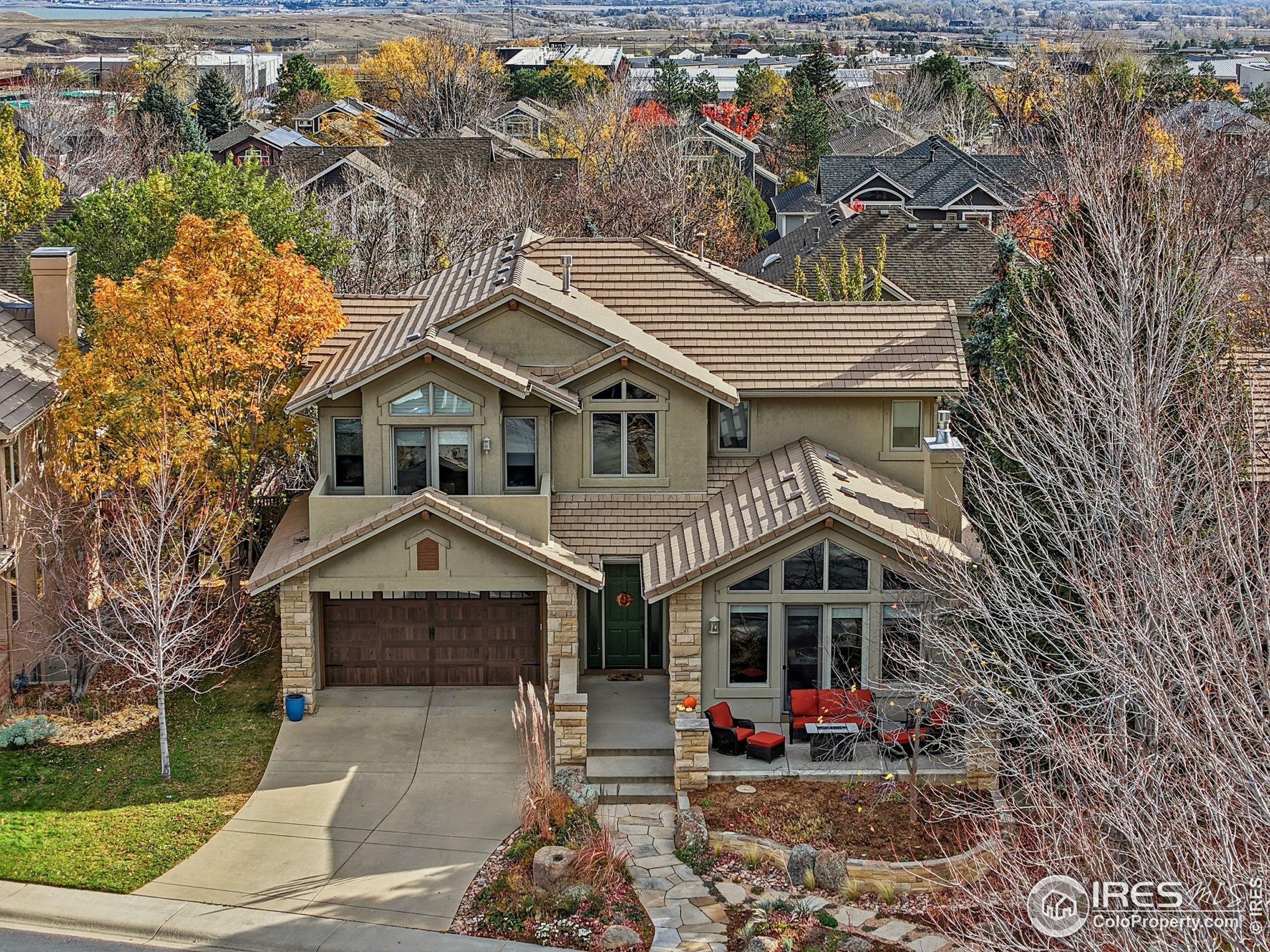 4840 6th Street Boulder, CO 80304 - Photo 42 of 48 a front view of a house with a yard