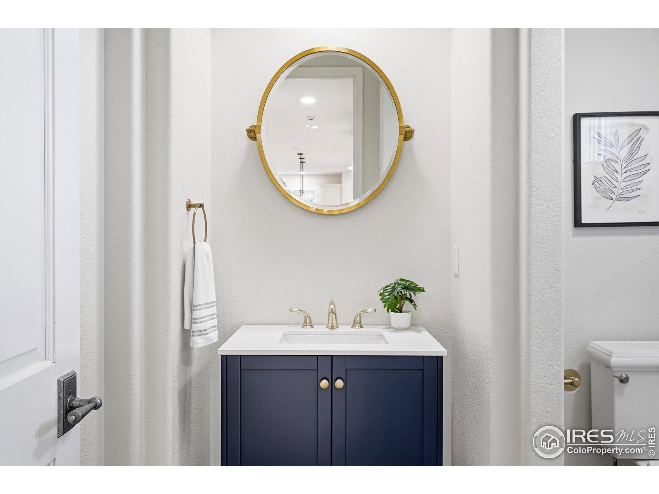 4840 6th Street Boulder, CO 80304 - Photo 47 of 48 a bathroom with a sink and a mirror