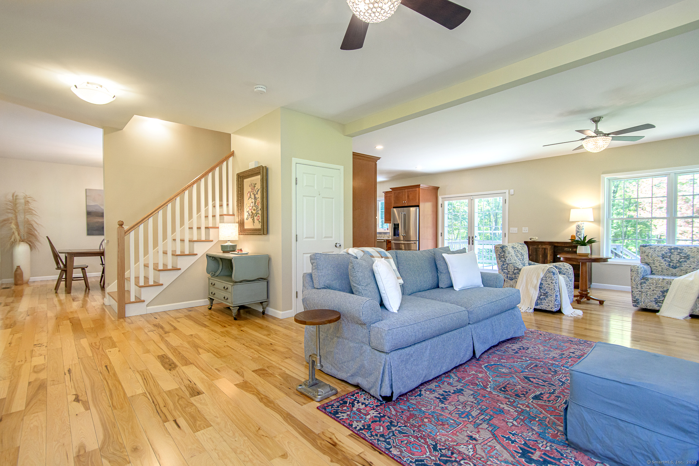 189 Center Road Woodstock, CT 06281 - Photo 11 of 40 a living room with furniture and a wooden floor