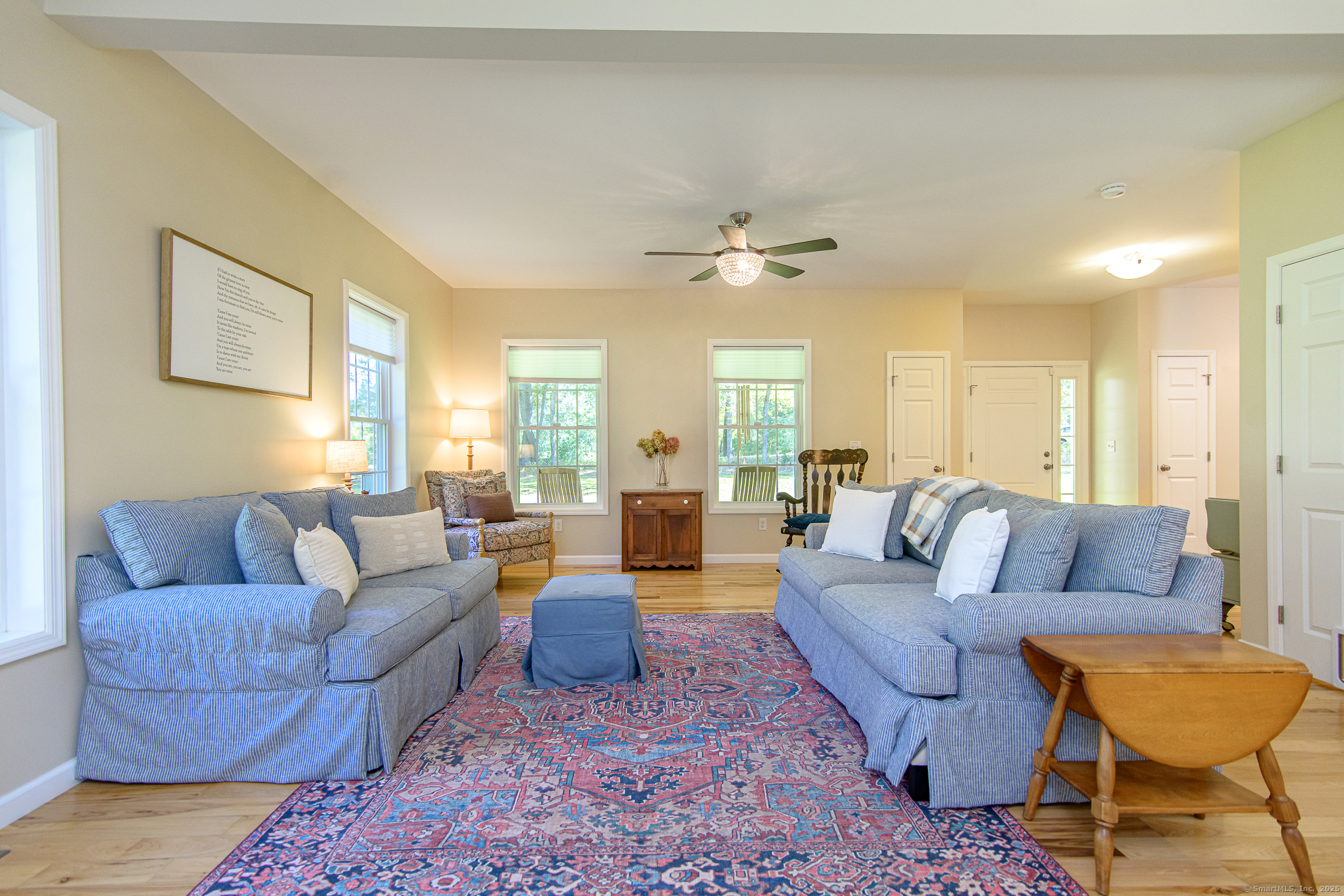 189 Center Road Woodstock, CT 06281 - Photo 12 of 40 a living room with furniture and a large window