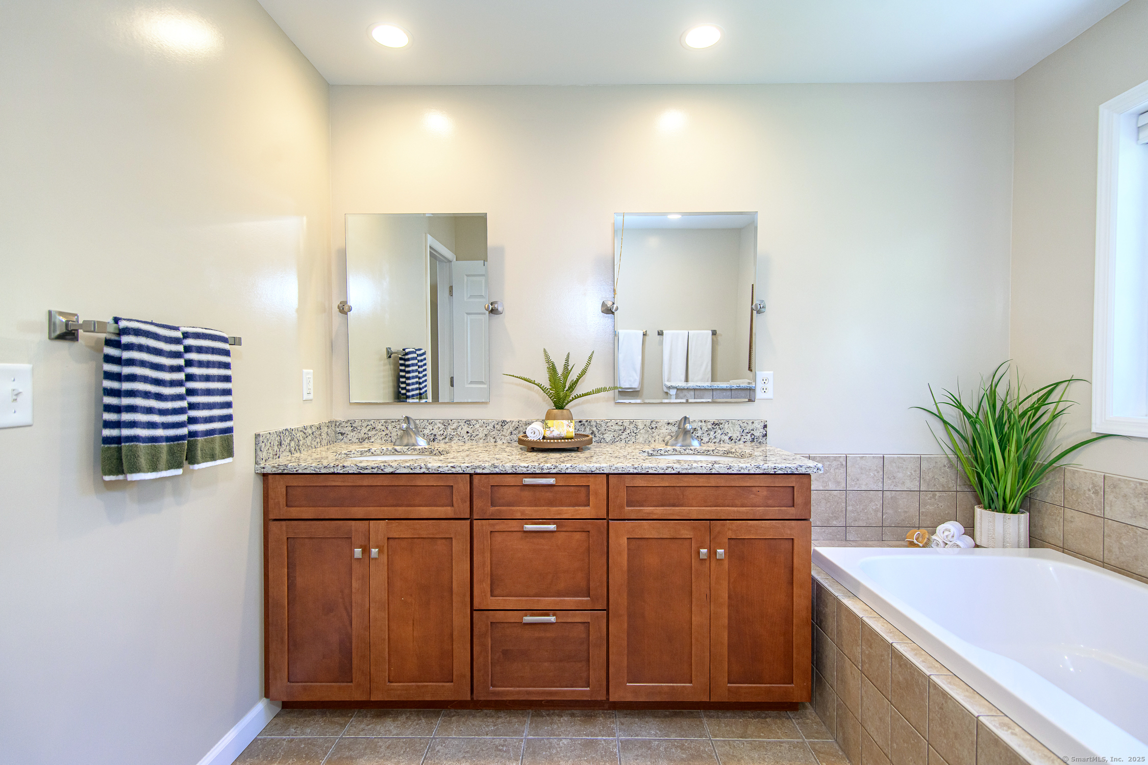 189 Center Road Woodstock, CT 06281 - Photo 33 of 40 a bathroom with a granite countertop sink and a mirror