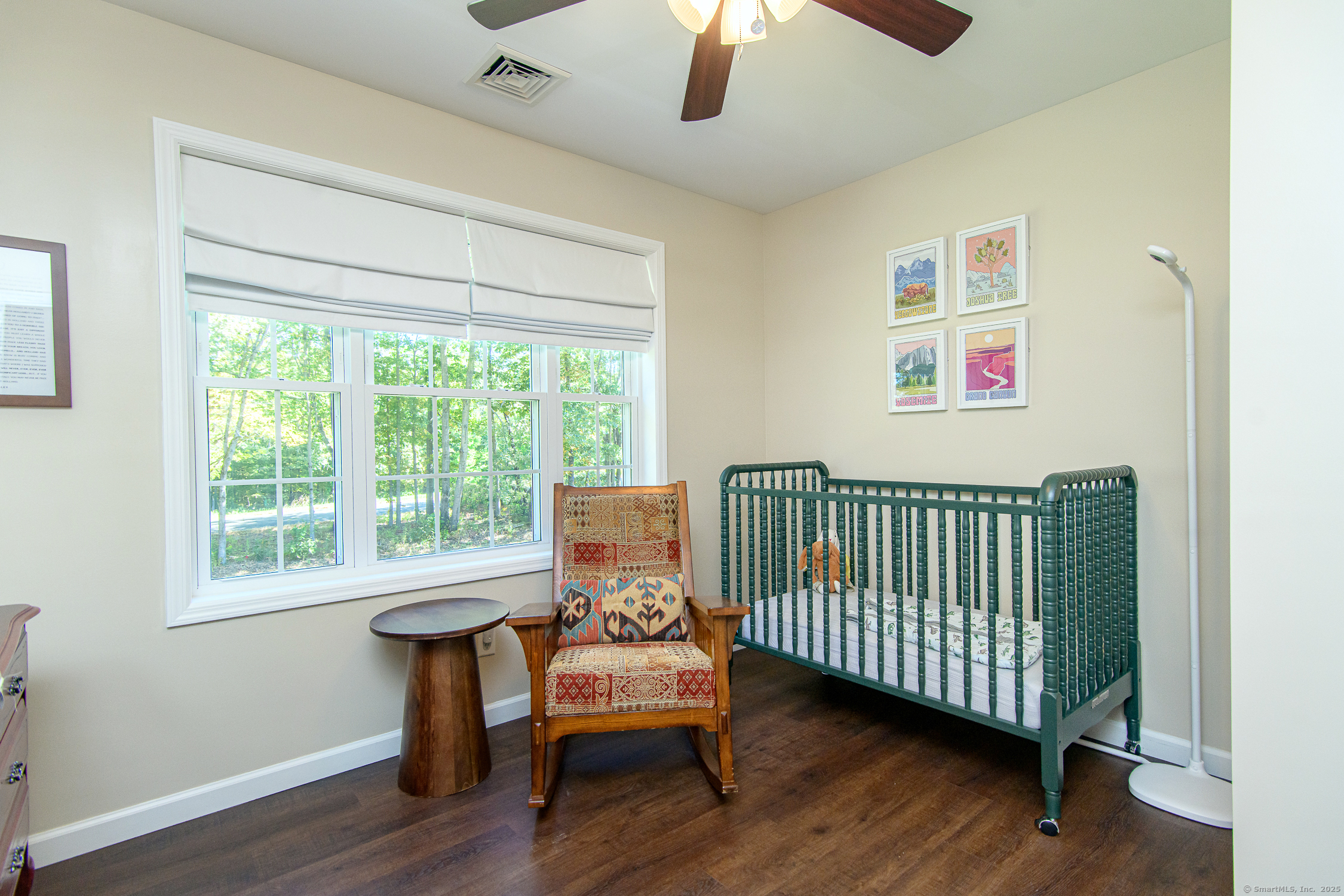 189 Center Road Woodstock, CT 06281 - Photo 39 of 40 a bedroom with a wooden bed and a window