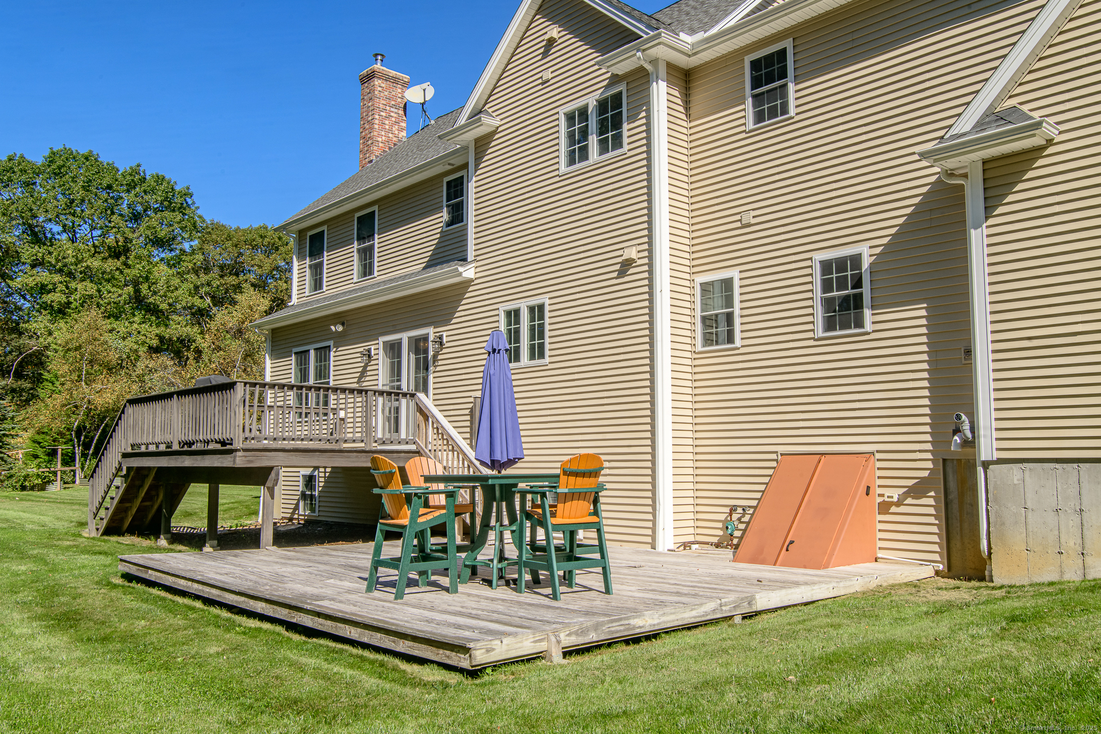 189 Center Road Woodstock, CT 06281 - Photo 6 of 40 a view of a house with backyard and a slide