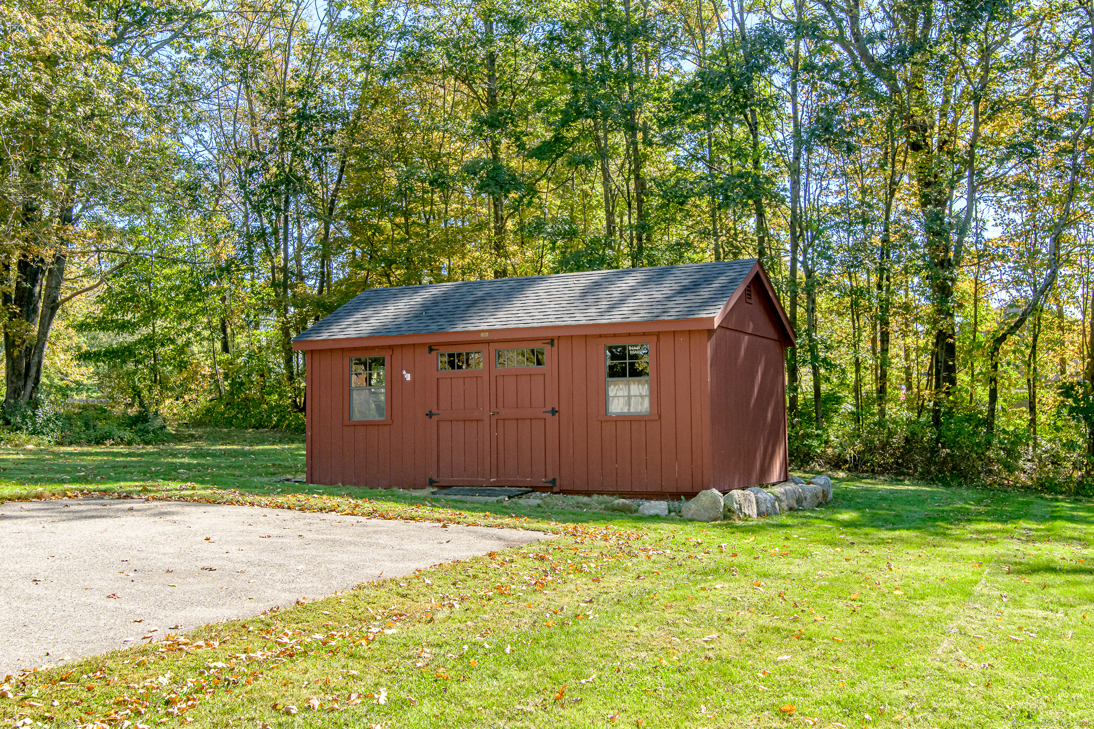 189 Center Road Woodstock, CT 06281 - Photo 7 of 40 a house with a tree in front of it
