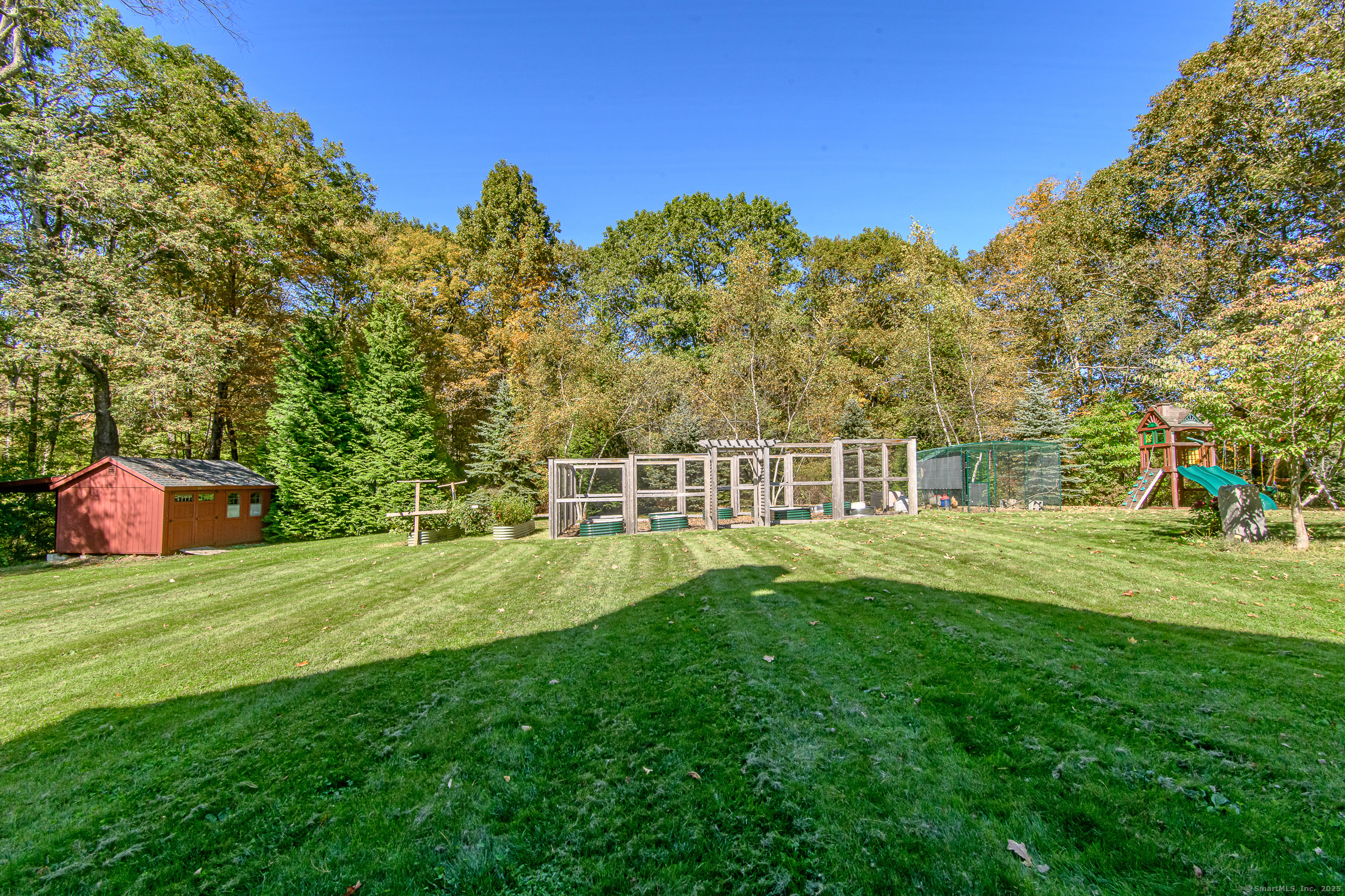 189 Center Road Woodstock, CT 06281 - Photo 9 of 40 a view of a house with a big yard