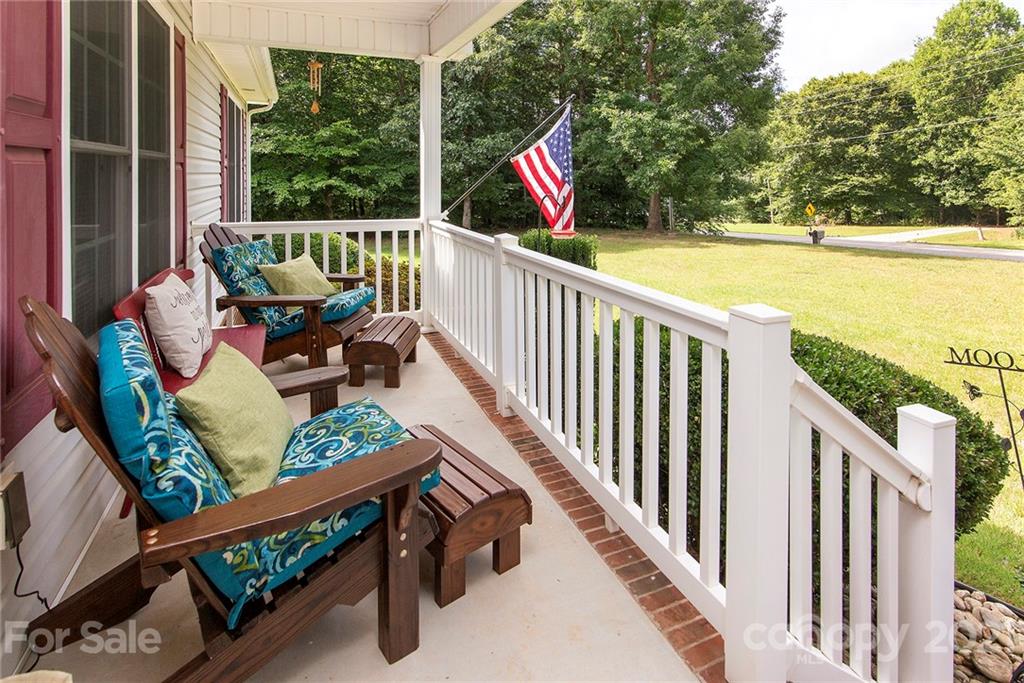 5019 King Wilkinson Road Denver, NC 28037 - Photo 3 of 27 a view of deck with furniture and garden