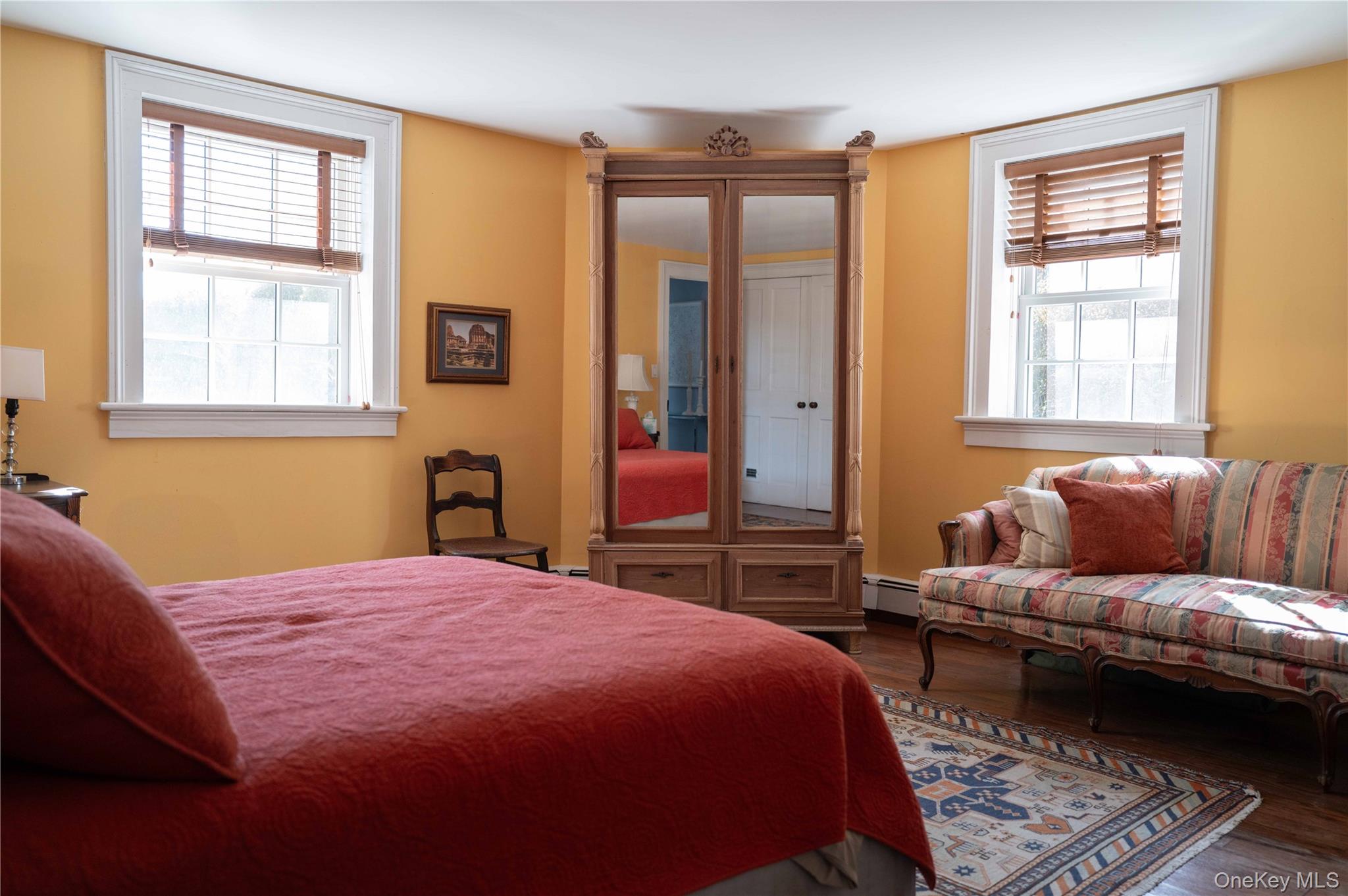 1281 Woods Road Germantown, NY 12526 - Photo 26 of 33 a bedroom with a bed couch and a window