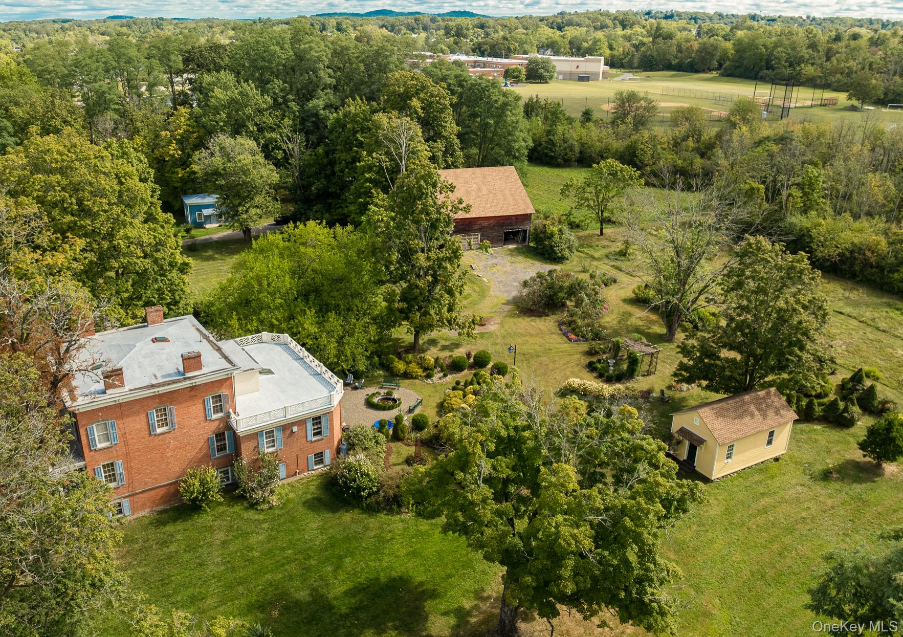 1281 Woods Road Germantown, NY 12526 - Photo 28 of 33 an aerial view of a house with a yard