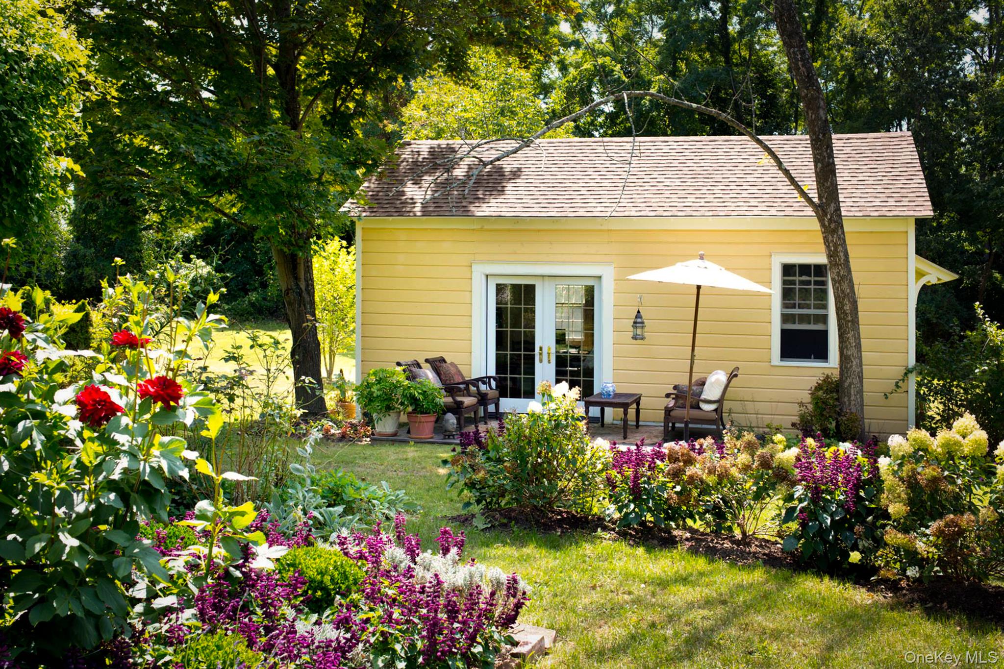 1281 Woods Road Germantown, NY 12526 - Photo 29 of 33 a view of a garden with flowers and flowers