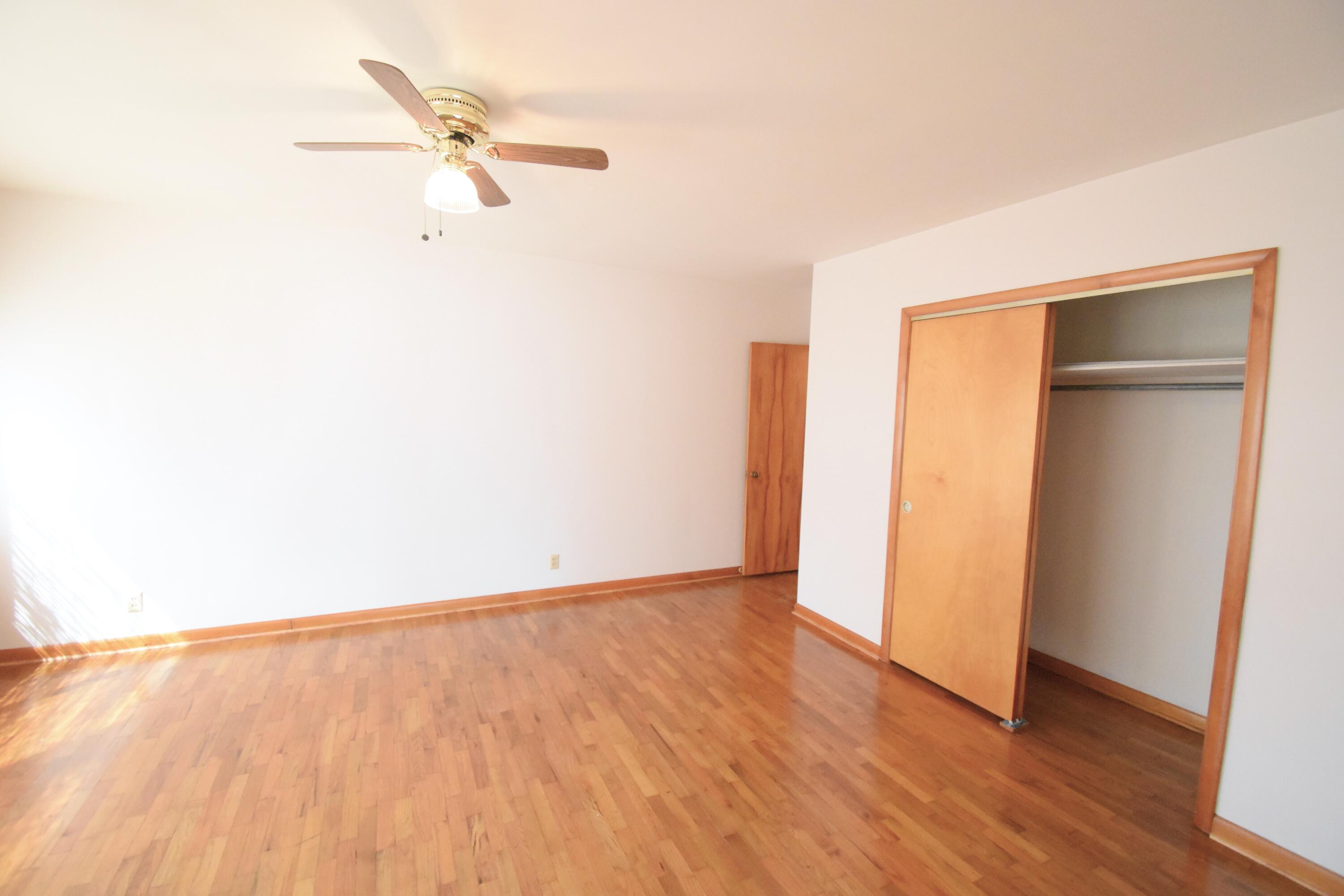 328 South Weston Street Rensselaer, IN 47978 - Photo 20 of 39 a view of an empty room with wooden floor