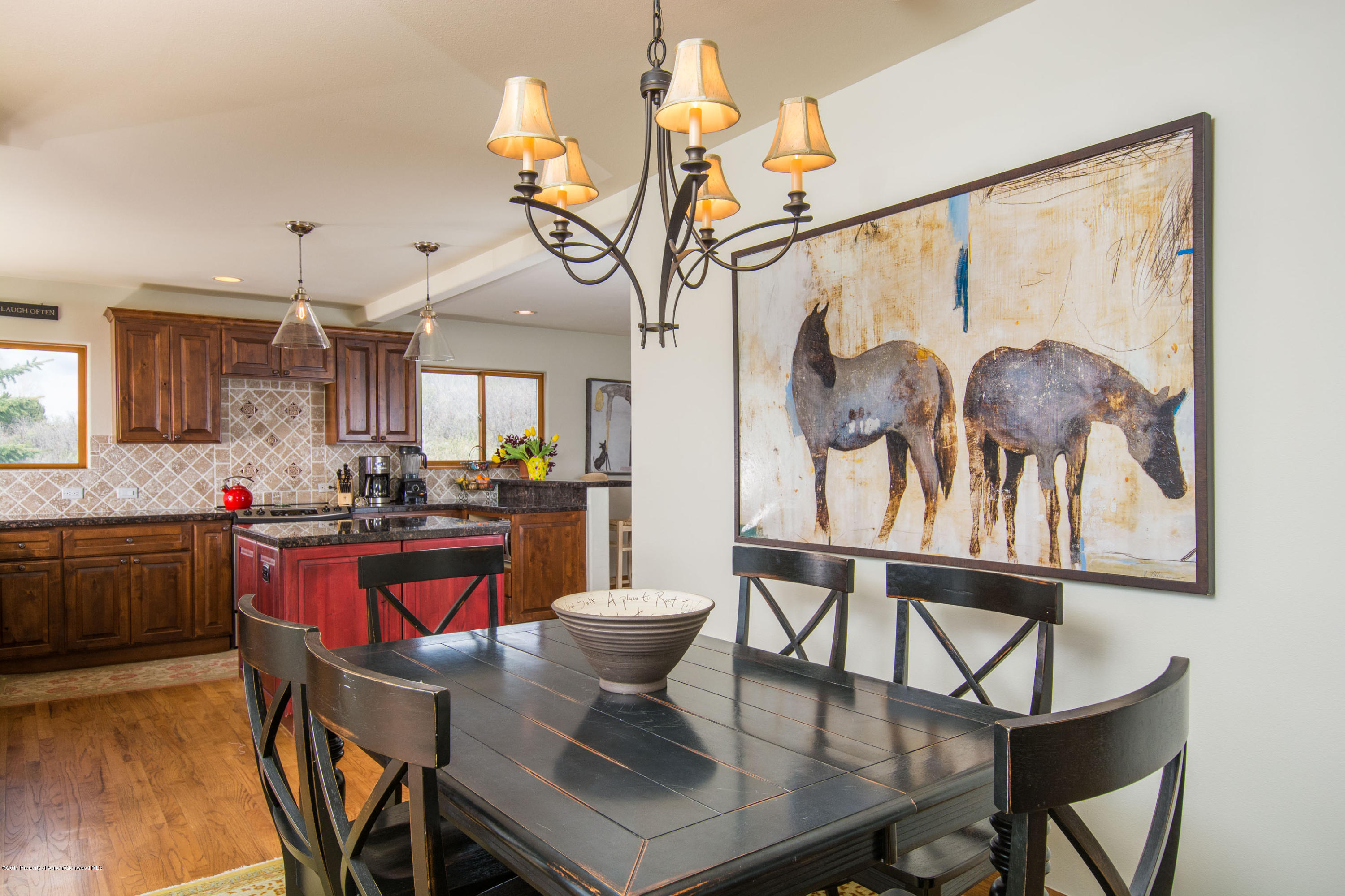 321 Mountain View Road Carbondale, CO 81623 - Photo 4 of 36 a view of a dining room with furniture and wooden floor