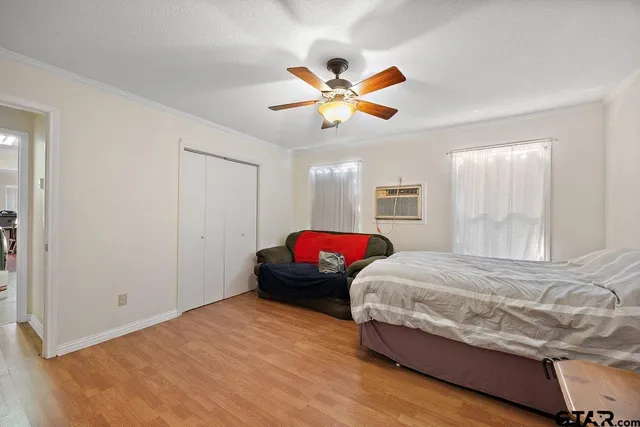 a view of a house with a garage and a tub