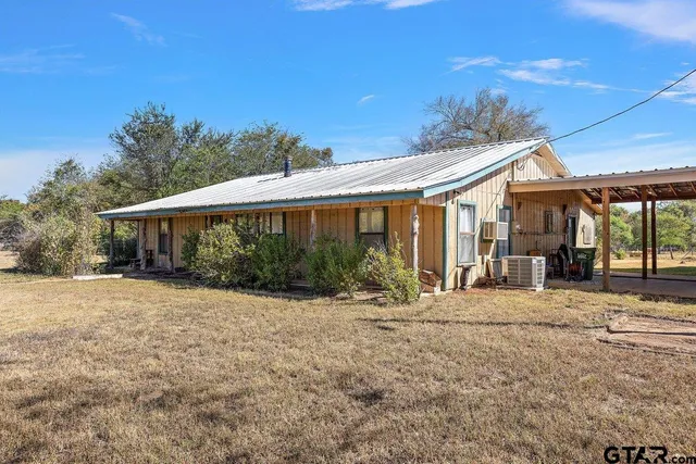 a front view of a house with a porch