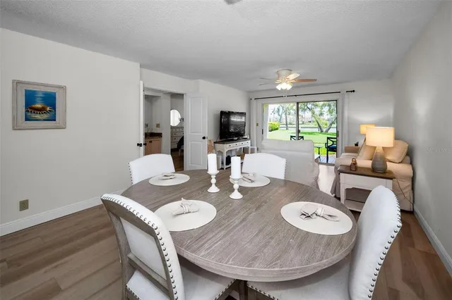 a view of a dining room with furniture