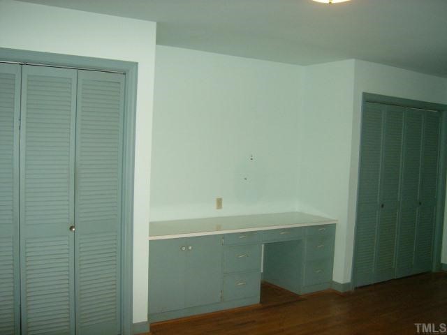 250 Winhaven Street Roxboro, NC 27573 - Photo 8 of 12 Master bedroom has built in desk, seperate his and her closet