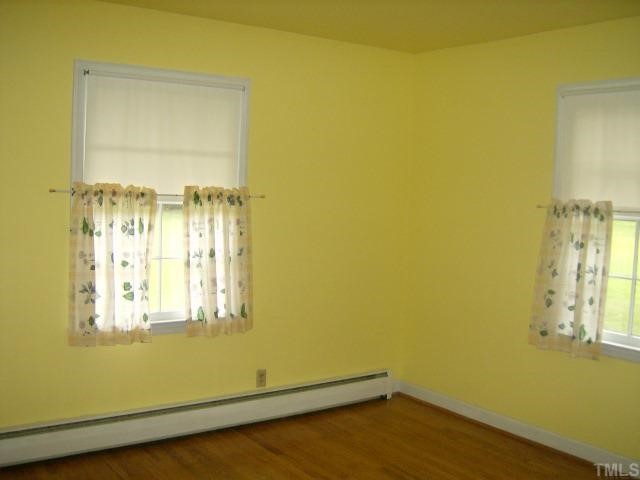 250 Winhaven Street Roxboro, NC 27573 - Photo 9 of 12 Split bedroom plan is offered in this home for more privacy. This is one of other bedrooms