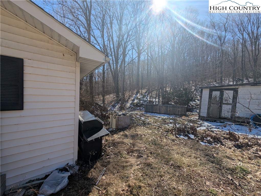 435 Edwards Road West Jefferson, NC 28694 - Photo 17 of 23 a view of a backyard