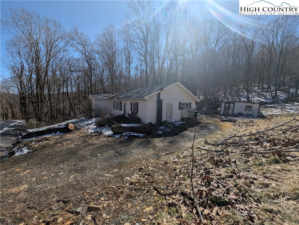 435 Edwards Road West Jefferson, NC 28694 - Photo 21 of 23 a view of a house with a yard