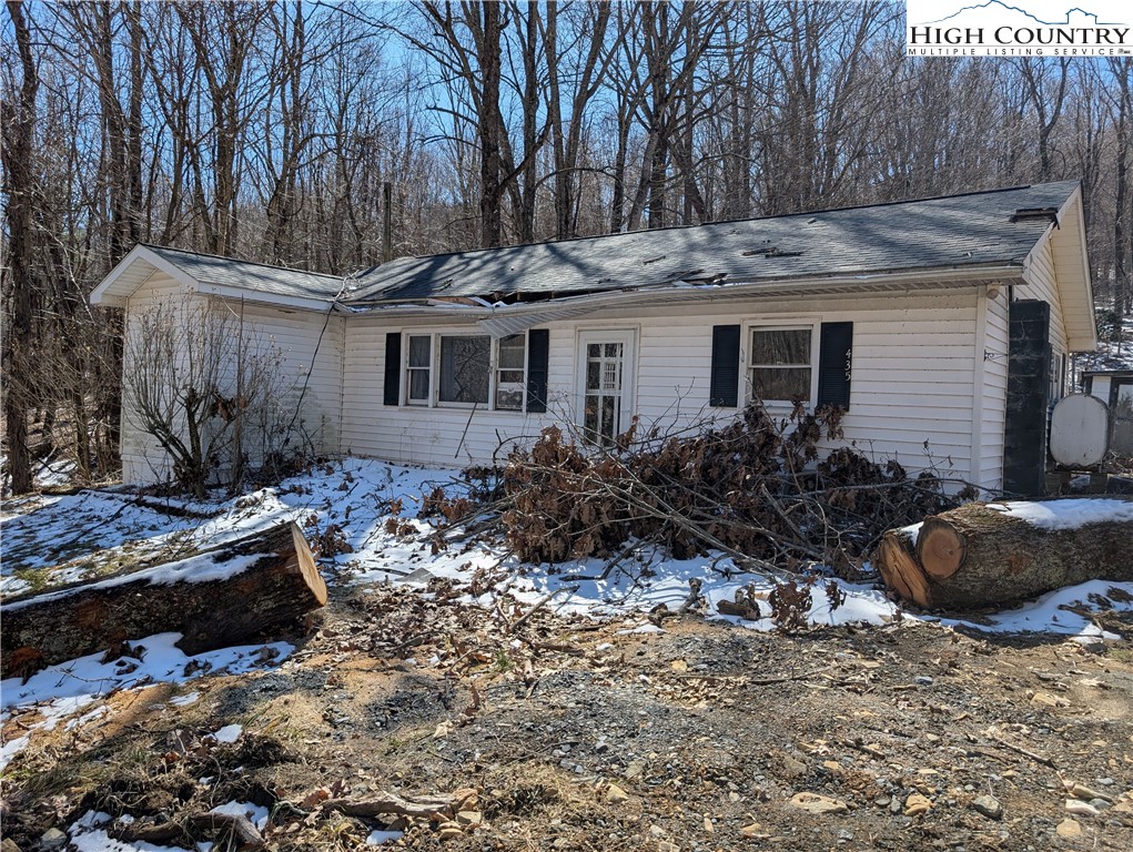 435 Edwards Road West Jefferson, NC 28694 - Photo 22 of 23 a view of a house with yard and sitting area