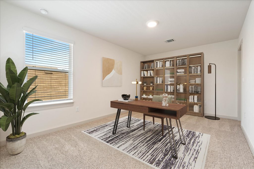 7410 Sagira Path Austin, TX 78724 - Photo 26 of 37 a view of a workspace with furniture and a potted plant