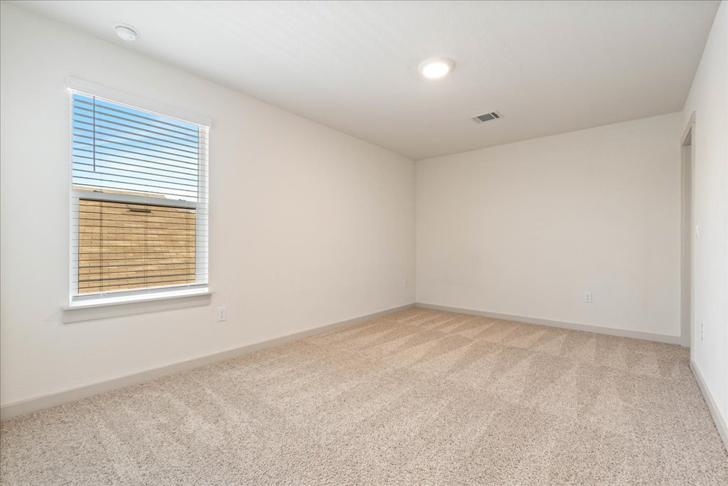 7410 Sagira Path Austin, TX 78724 - Photo 27 of 37 an empty room with a window