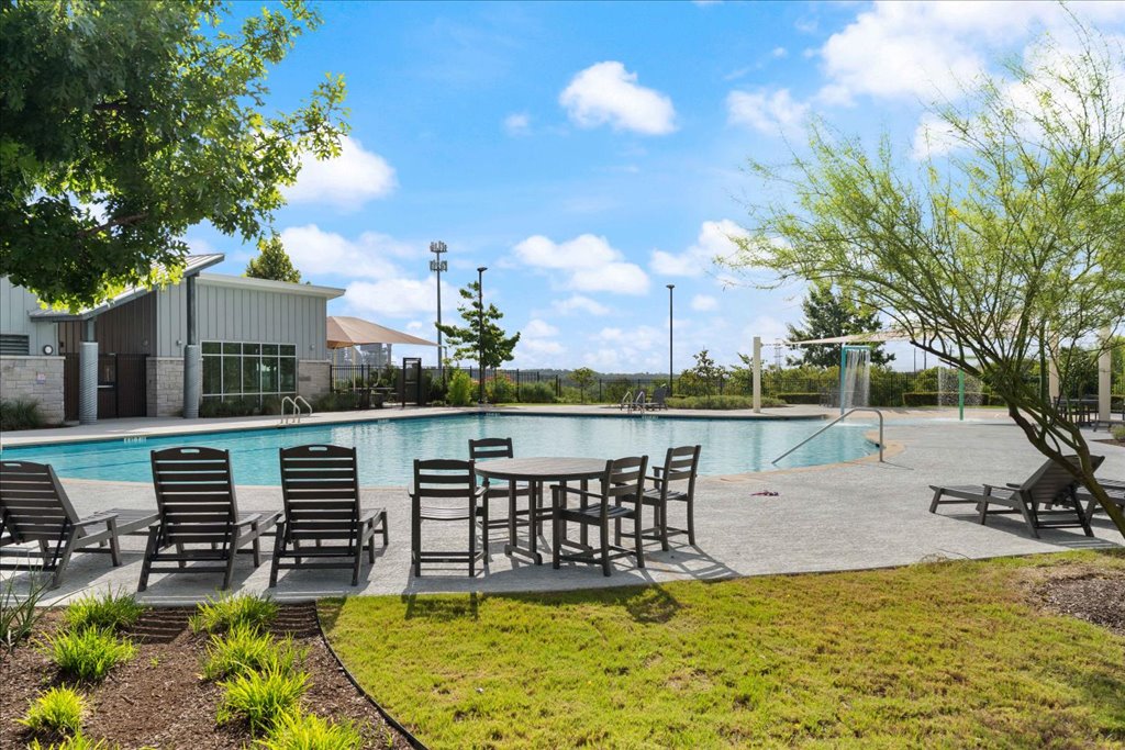 7410 Sagira Path Austin, TX 78724 - Photo 34 of 37 a view of a lake with a house