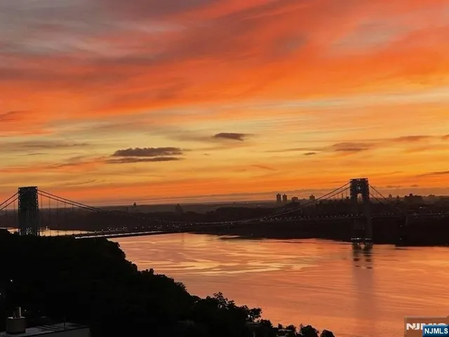 a view of a city with tall buildings