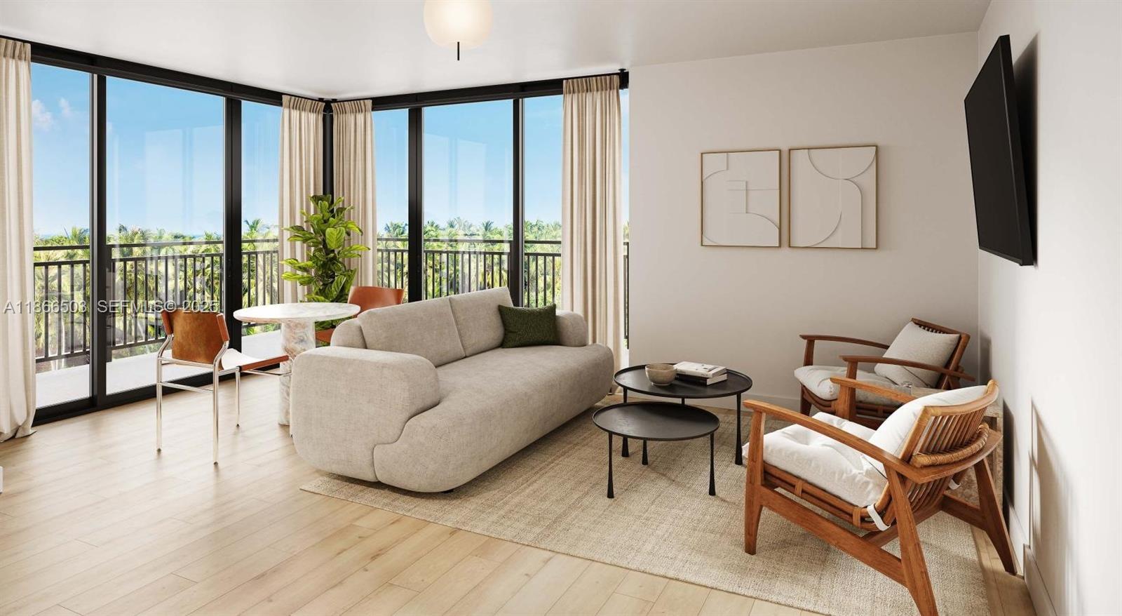 4465 Griffin Road, Unit B5 Davie, FL 33314 - Photo 10 of 13 a living room with furniture and a floor to ceiling window