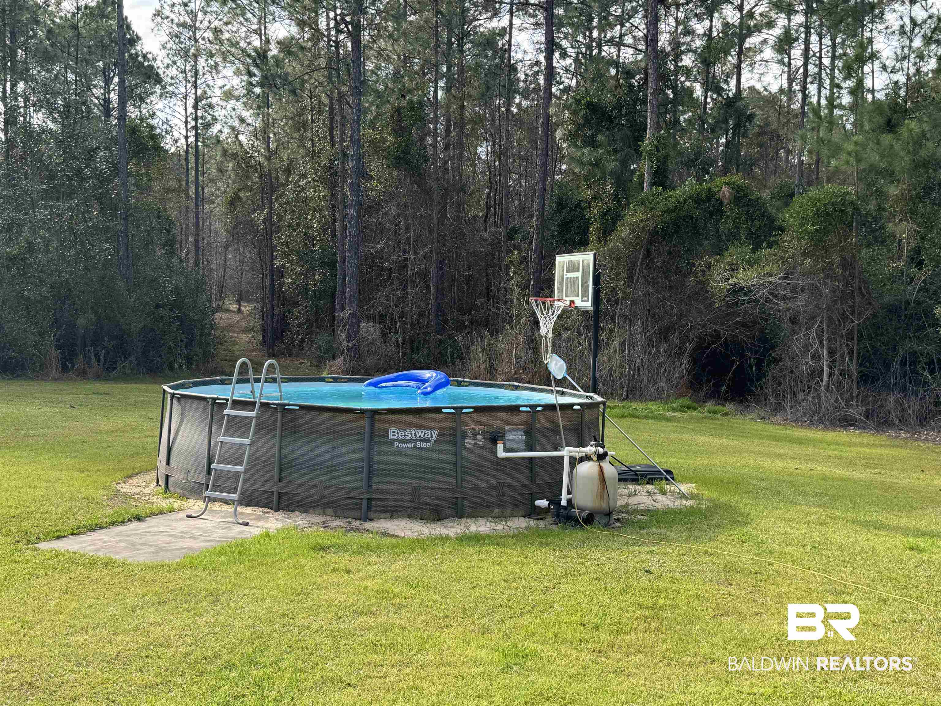 51235 Phillipsville Road Bay Minette, AL 36507 - Photo 9 of 63 Outdoor pool featuring a lawn