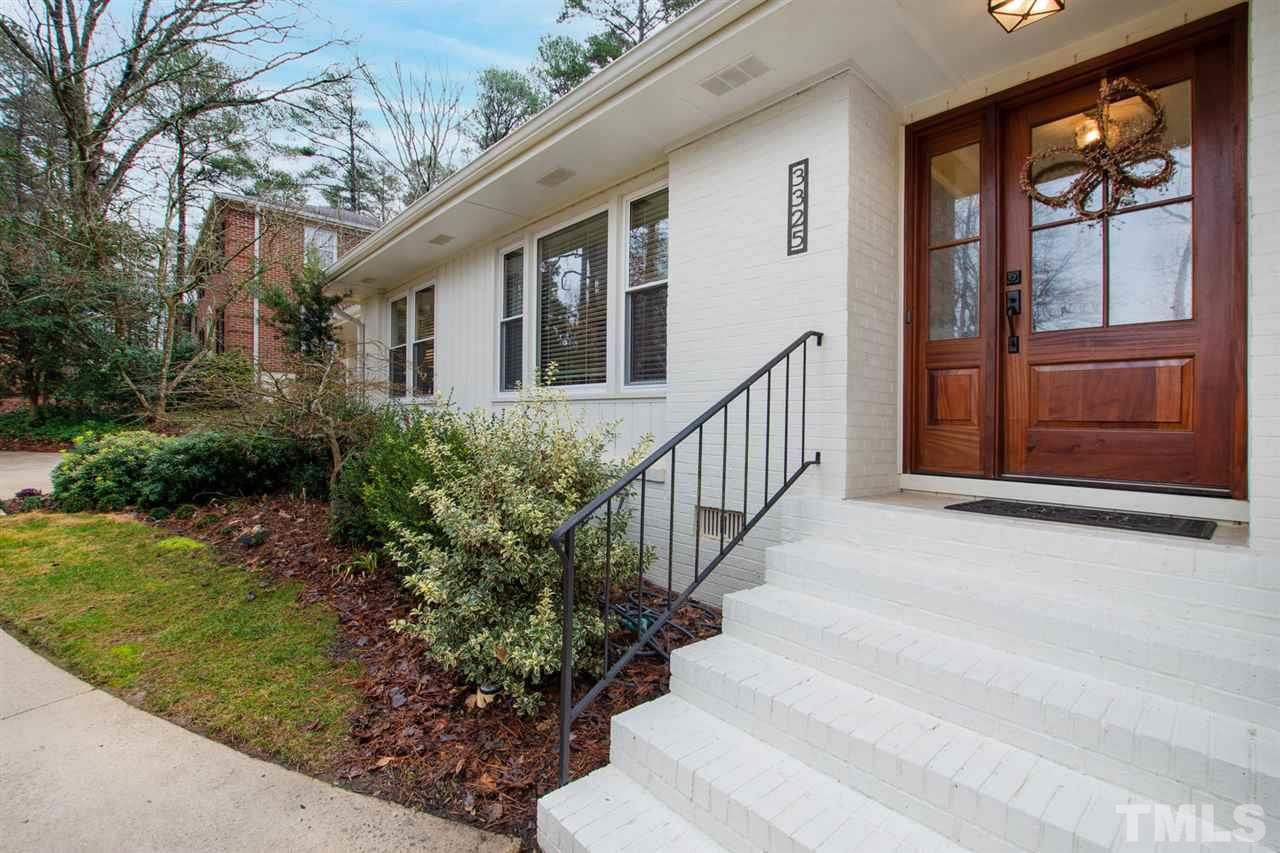 3325 Horton Street Raleigh, NC 27607 - Photo 3 of 30 a view of a house with a yard