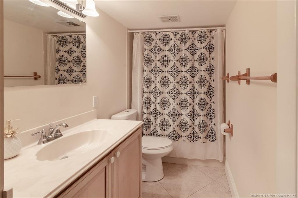 1811 Southwest Palm City Road, Unit A201 Stuart, FL 34994 - Photo 13 of 20 Guest Bathroom
