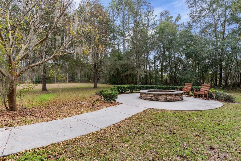 2004 Southwest 188th Street Newberry, FL 32669 - Photo 11 of 14 a view of a yard with swimming pool