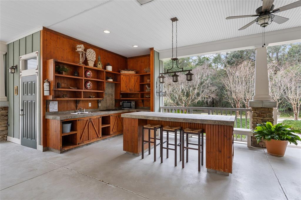 2004 Southwest 188th Street Newberry, FL 32669 - Photo 9 of 14 a large kitchen with a table and chairs