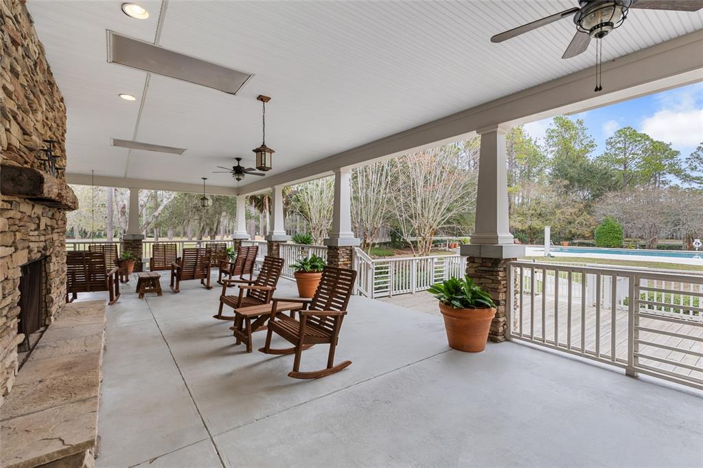 2004 Southwest 188th Street Newberry, FL 32669 - Photo 10 of 14 a living room with patio furniture and potted plants