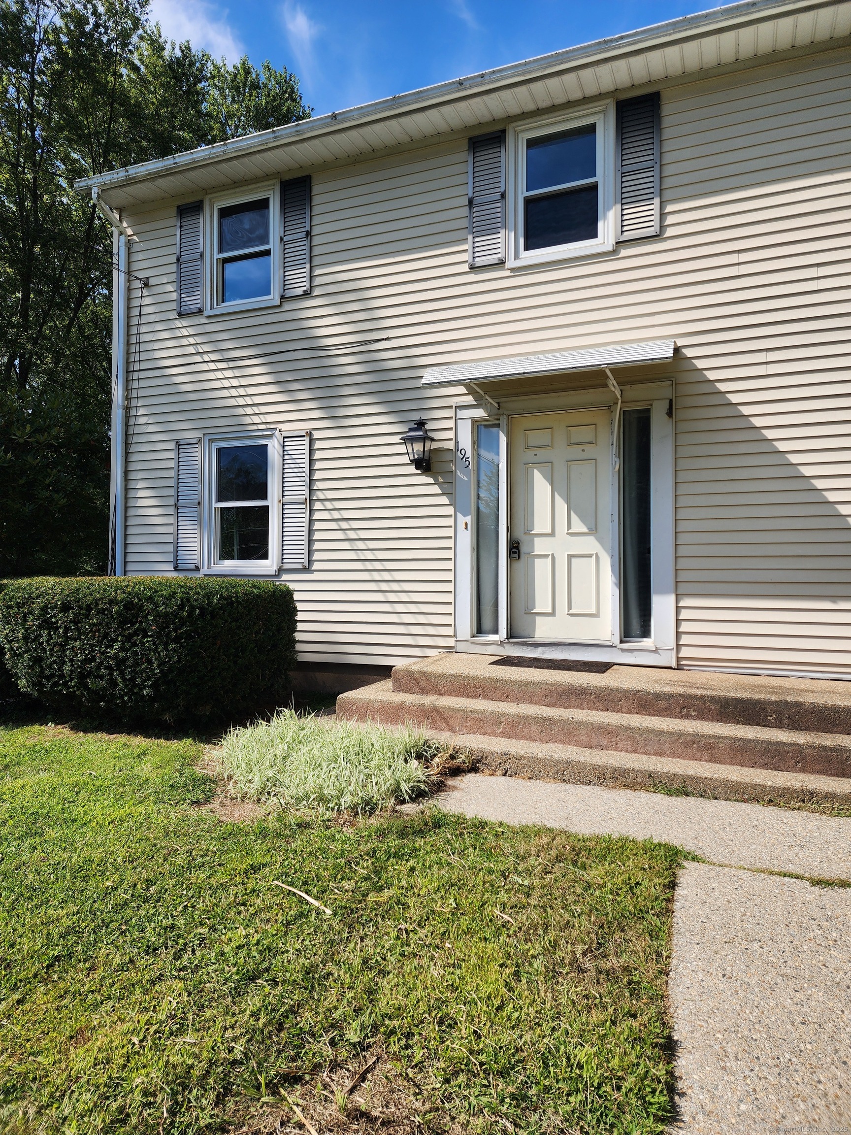195 Wall Street Hebron, CT 06248 - Photo 11 of 12 a view of a house with a backyard