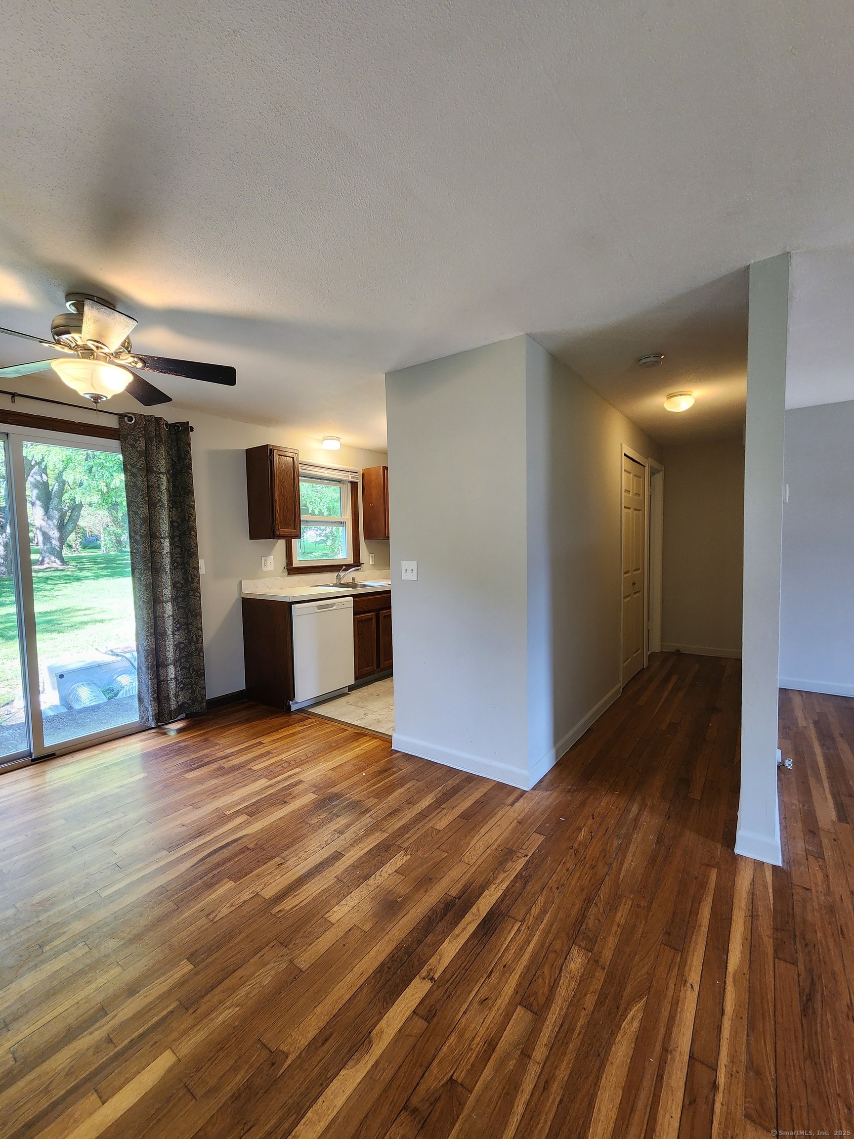 195 Wall Street Hebron, CT 06248 - Photo 3 of 12 a view of a kitchen with a sink and a stove top oven
